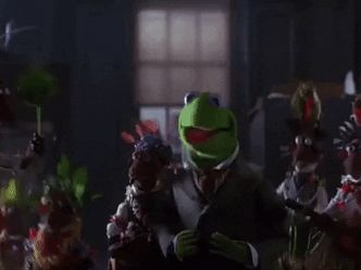 What is the name of the tune sung by Kermit the Frog on Christmas Eve in The Muppet Christmas Carol?