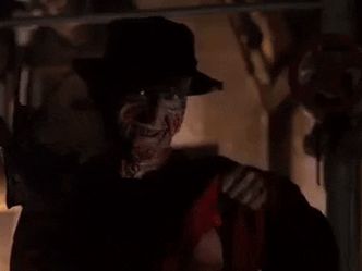 In the film Nightmare on Elm Street what item did Nancy pull out of her dream