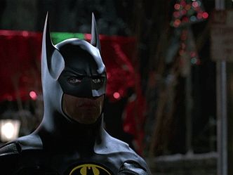 What is the name of the actor who played Batman in the 1989 movie directed by Tim Burton?