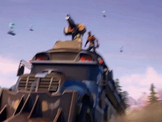 What is the iconic blue bus that carries players to the starting island of the Battle Royale map called? 