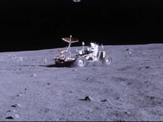 What year did the first crewed mission to land on the moon happen?