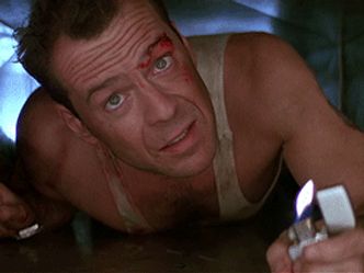 Which Christmas song plays during the end credits of Die Hard?