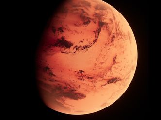 What gives the planet Mars its red appearance?