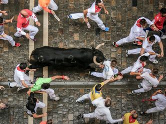 Where does the most popular running of the bulls event occur?