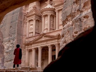 The ancient city of Petra, famous for its rock-cut architecture, is located in which modern-day country?
