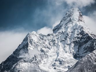 Who was one of the first two people to summit Mount Everest?