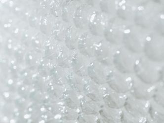 What were Alfred Fielding and Marc Shuvon trying to make when they invented bubble wrap?