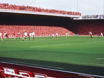 In which stadium did Arsenal play before moving to the Emirates Stadium?