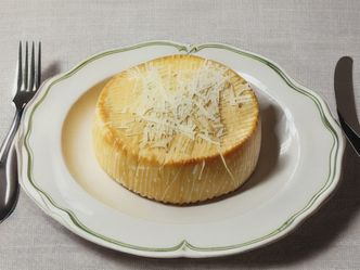 Where does Parmesan Cheese originate from?