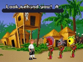 Guybrush often tries to distract other characters by saying there's a ___ behind them.