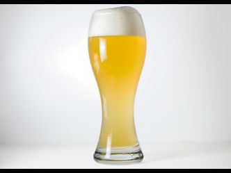 What ingredient of Weissbier primarily separates it from regular beer?