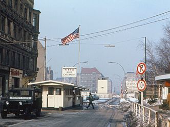 What's the location of this famous border crossing in Berlin?