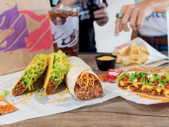 Taco Bell introduced a popular advertising campaign in 1997 that featured a talking what?