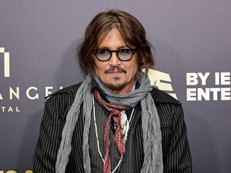 Johnny Depp was inducted onto the Hollywood Walk of Fame in what year?
