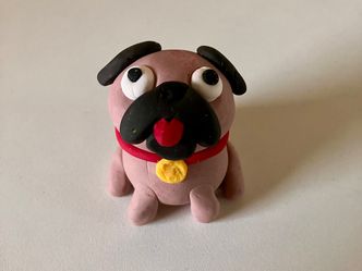 This iconic character is from Spelunky but what is the dog breed? 