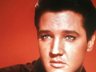 How many singles did Elvis Presley release in total?