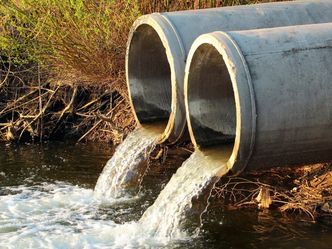 How many discharges of raw sewage into UK waterways were there in 2022?