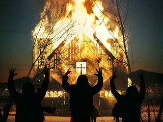 What is the name of the famous church burned down by Varg Vikerness?