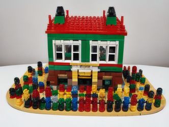 In what year were the first LEGO bricks produced?