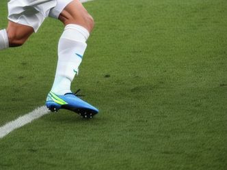 Which term refers to a soccer player's ability to use both feet equally well?
