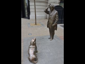 This statue of fictional detective "Columbo", and his dog is found in this country's capital