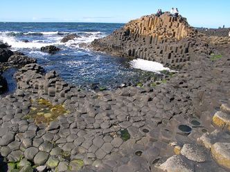 The "Giant's Causeway" is a natural rock formation and International tourist attraction located where?