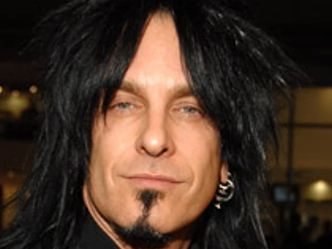 Which Rock band is associated with the infamous Nikki Sixx?