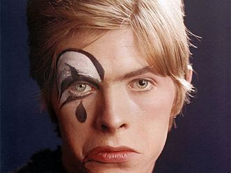 What movie that David Bowie appear in, did Ryuichi Sakamoto write the music for?