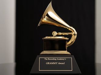 Which artist has won the most Grammys (31 in total) till 2021