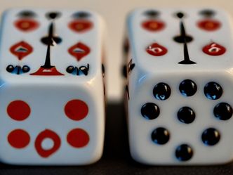 How many dots appear on a pair of dice?
