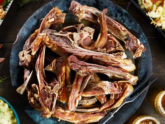 In which country might you be eating dried sheep ribs or Pinnekjøtt on Christmas Day?